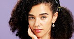 Portrait, touch and woman in studio for skincare, natural aesthetic or facial shine for wellness. Healthy glow, dermatology and person with soft texture, afro hair or self care on purple background