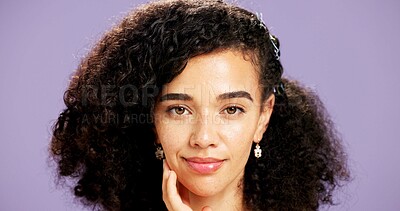 Buy stock photo Portrait, touch and woman in studio for dermatology, natural aesthetic or facial shine for wellness. Healthy glow, skincare and person with soft texture, afro hair or self care on purple background