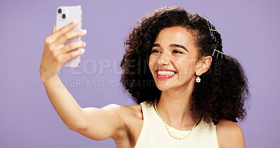 Buy stock photo Happy woman, social media and gen z with selfie in studio for memory on a purple background. Female person, model or smile with capture moment or connection for network, y2k post or online app