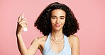 Skincare, face mist and portrait of woman in studio for natural, hydration and dermatology. Happy, product and female person with setting spray for facial cosmetology routine by pink background