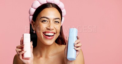 Buy stock photo Portrait, skincare product or woman with headband in studio, beauty treatment or self care for wellness. Healthy glow, facial toner or person with dermatology bottles, mockup space or pink background