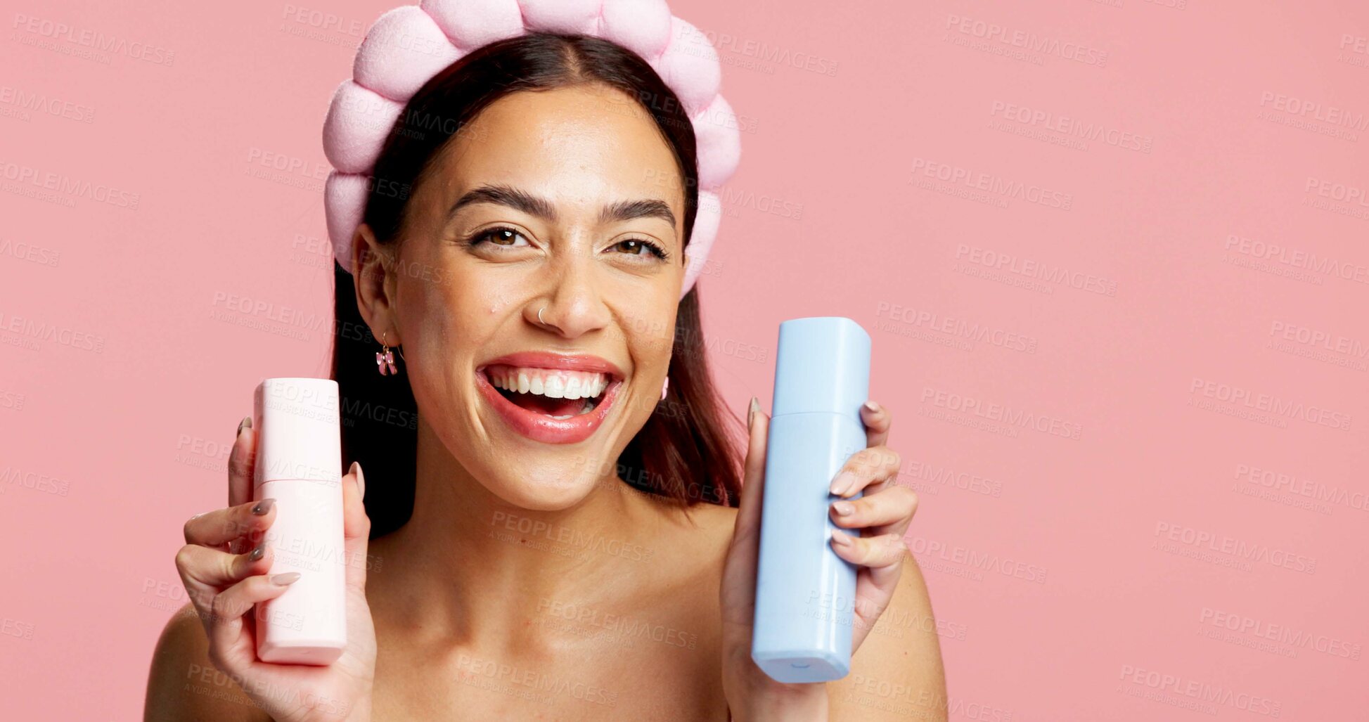 Buy stock photo Portrait, skincare product or woman with headband in studio, beauty treatment or self care for wellness. Healthy glow, facial toner or person with dermatology bottles, mockup space or pink background