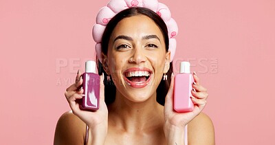 Buy stock photo Portrait, skincare and woman with bottle in studio, beauty treatment or headband for wellness shine. Healthy glow, advertising or person with facial product for dermatology, mockup or pink background