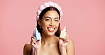 Portrait, skincare or woman with serum in studio, beauty treatment or headband for wellness shine. Healthy glow, dermatology or person with hyaluronic acid bottle, mockup space or pink background