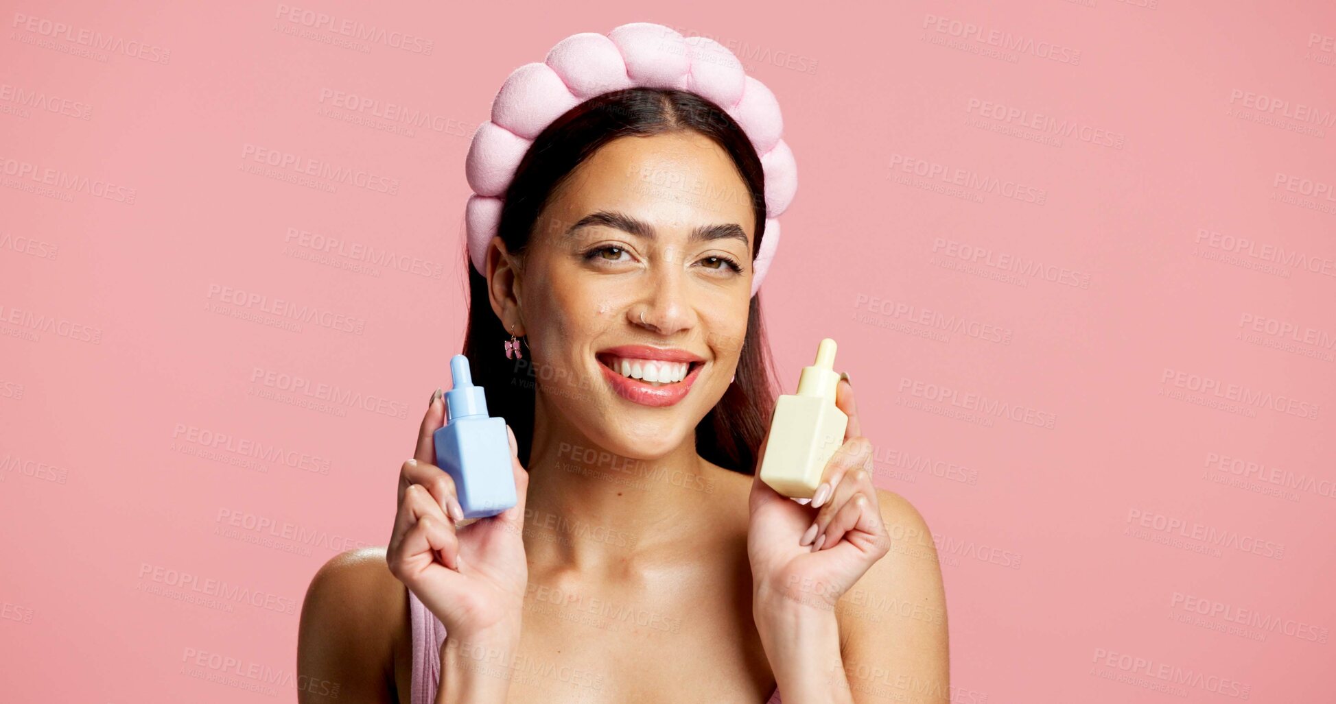 Buy stock photo Portrait, skincare or woman with serum in studio, beauty treatment or headband for wellness shine. Healthy glow, dermatology or person with product for advertising, mockup space or pink background
