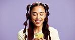 Fashion, smile or woman in studio with phone, app browse or internet search for styling tips. Happy, digital or girl on purple background with tech, gen z or blog inspiration for trendy aesthetic.