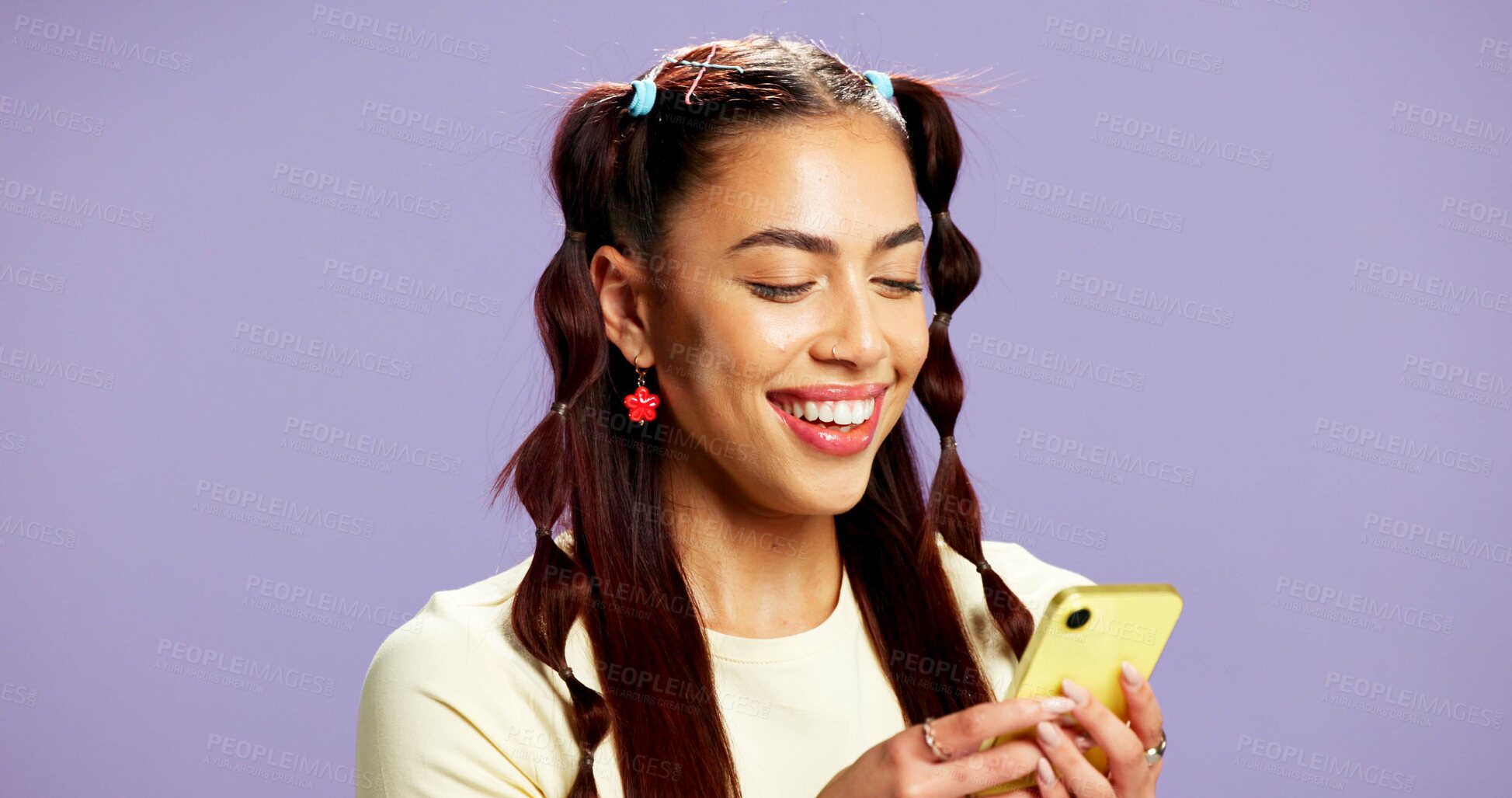 Buy stock photo Fashion, scroll or woman in studio with phone, app browse or internet search for styling tips. Digital, smile or girl on purple background with tech, gen z or blog inspiration for trendy aesthetic.