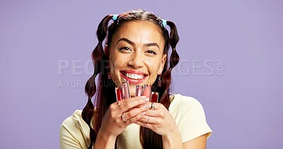 Buy stock photo Makeup, lipgloss and portrait of woman in studio for choice, beauty treatment or glow. Happiness, cosmetology and gen z with person on purple background space for self care, cosmetics and shine