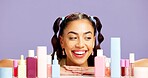 Makeup, smile and product with woman in studio for skincare, beauty treatment or glow. Happiness, cosmetology and gen z with person on purple background space for self care, cosmetics and shine