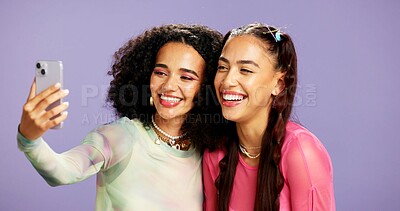 Buy stock photo Gen z, selfie and friends in studio with makeup, self care and facial cosmetology together. Smile, love and women with beauty for social media, post and laugh for bonding by purple background
