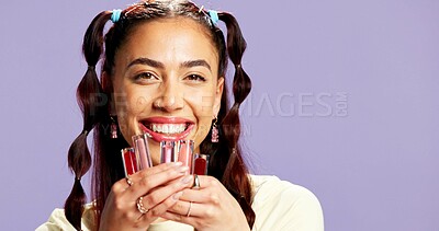 Buy stock photo Beauty, portrait or woman in studio with lip gloss, hydration and plumping with cosmetic product. Happy, space or girl on purple background with mouth treatment, color or shine finish in gen z makeup