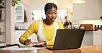 Finance, balance sheet or black woman in house with laptop, budget or writing for home asset management. Notes, tax compliance and girl at table with tech, bills or bookkeeping in invoice receipt.