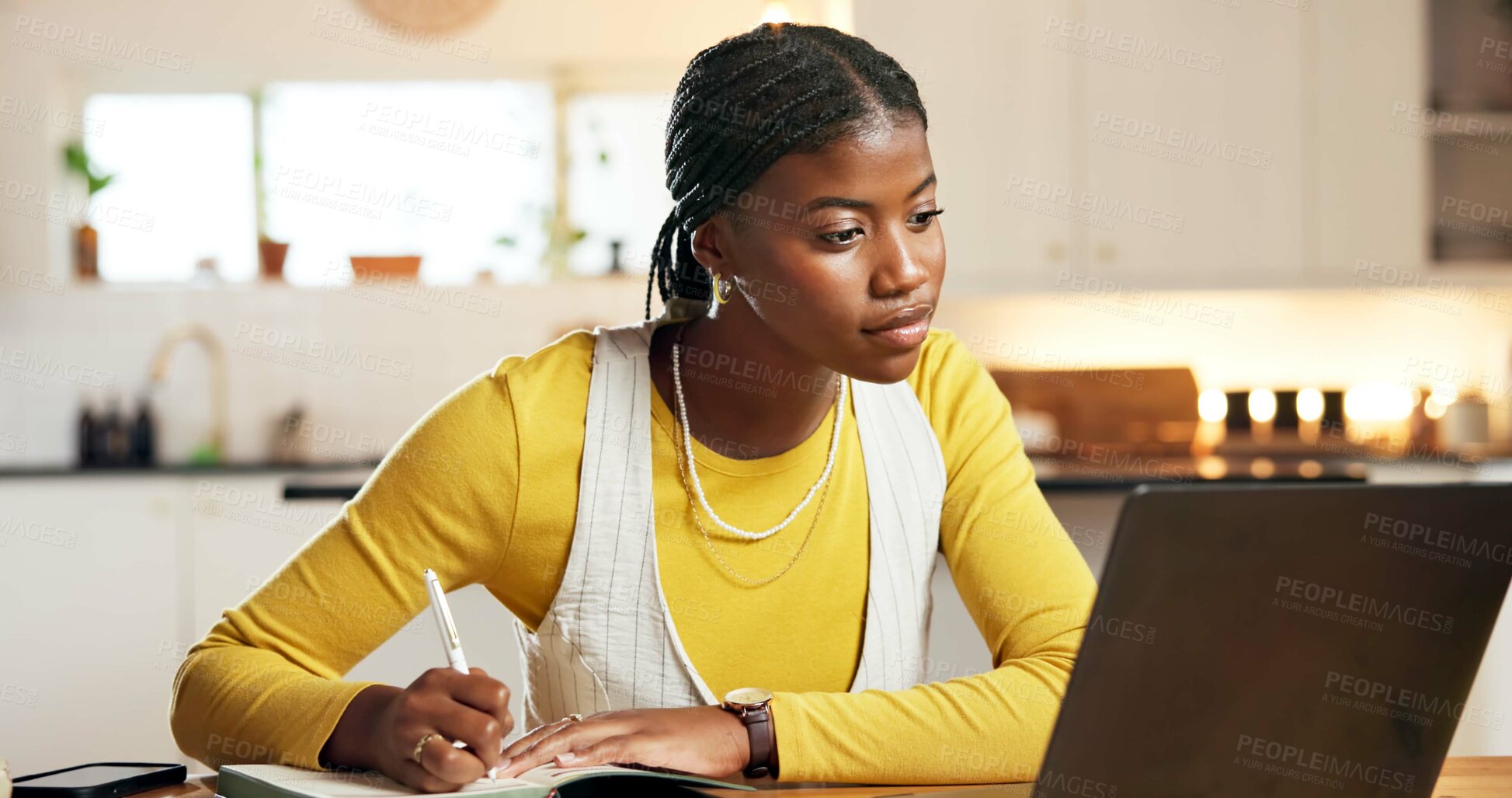 Buy stock photo Writing, review or black woman in house with laptop, draft edit or magazine update in remote work. WFH, tech or copywriter at table with notebook, article or story pitch for digital publication.