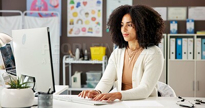 Buy stock photo Healthcare, woman and pediatrician with computer for typing report, email or patient history. African person, doctor  and desktop for medical expert with clinic schedule, insurance info and research