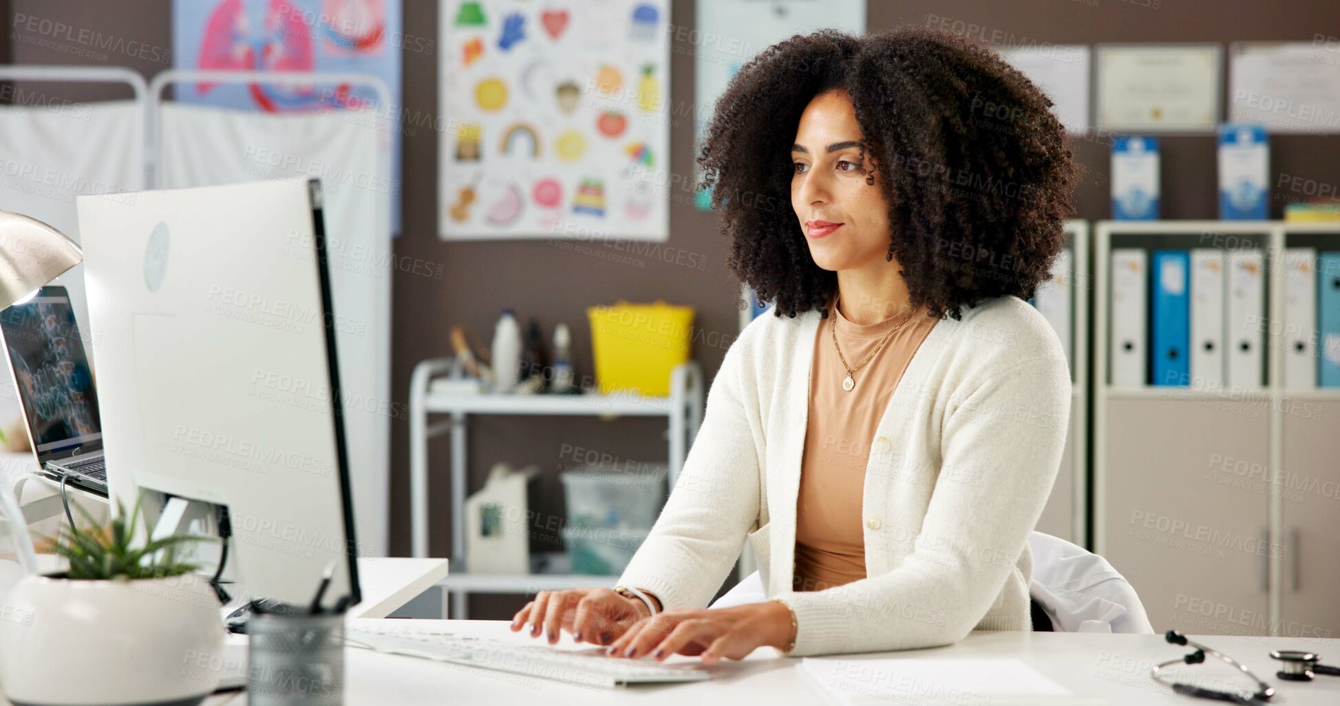 Buy stock photo Healthcare, woman and pediatrician with computer for typing report, email or patient history. African person, doctor  and desktop for medical expert with clinic schedule, insurance info and research