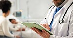 Doctor, hands or typing in hospital with tablet for pediatric patient history, medical record or info. Pediatrician, man and scroll with digital tech for health insurance plan, evaluation and review.