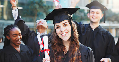 Buy stock photo Graduation, diploma and portrait of woman in college for achievement, scholarship and degree success. University certificate, academy pride and event with students on campus for award ceremony