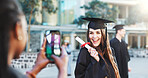Graduation, photography and woman with certificate, university and excited for success or milestone. Student, laugh and people with robes for ceremony, education or picture for achievement in college