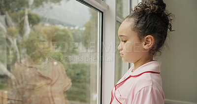 Buy stock photo Sad, child and thinking at window in home with stress, abandoned and trauma from separation. Reflection, orphan or girl kid with depression in house with anxiety or waiting on adoption at foster care