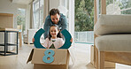 Father, child or driving in box in new home for property investment, race game or mortgage security. Family house, excited people and push with fantasy steering wheel for relocation fun and bonding