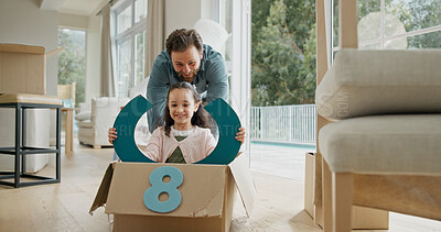 Buy stock photo Father, child or riding in box in new home for property investment, game or mortgage security. Family house, excited people and push with fantasy steering wheel for relocation fun and bonding