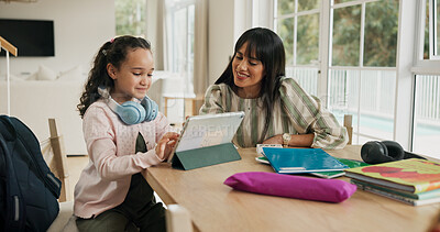 Buy stock photo Education, homework or tablet with mother and daughter in home together for learning or study. App, child development or research with girl and single parent woman in apartment for online course