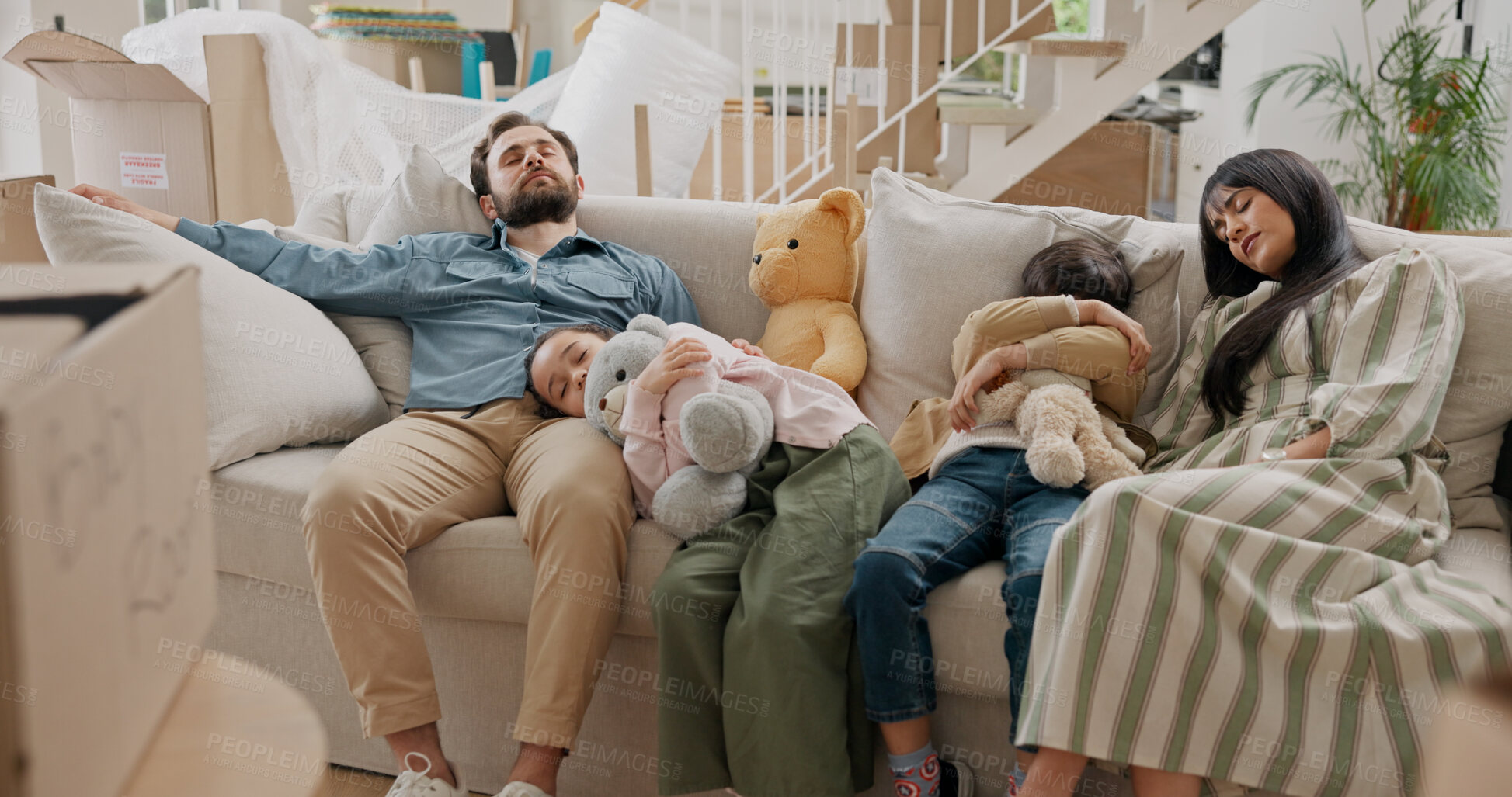 Buy stock photo Family, tired and sleeping in new home with boxes, toys and children on sofa, comfort and rest in lounge. People, parents and kids with property, exhausted or nap for real estate investment at house