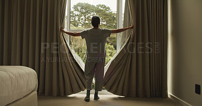 Buy stock photo Wake up, curtain and back of woman in hotel room for morning routine, accommodation getaway and relax. Window, hospitality and view with person in house rental for comfortable, trip and sunrise