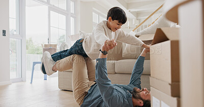 Buy stock photo Moving, son and father playing airplane in new home, real estate and happy bonding in family house. Lounge, property investment and man lifting child in air, flying game and connection for support