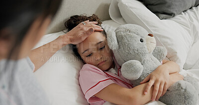 Buy stock photo Mother, sick child and check for fever in bed, support and monitor illness symptoms of daughter. Comfort, teddy bear and woman care for sad girl with temperature, virus infection and touch forehead
