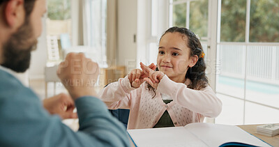 Buy stock photo Dad, kid and learning sign language in home for development, growth and care in homeschool. Education, father and teaching student asl, hand gestures and happy girl with hearing disability in house