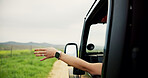 Hands, person and window of car for road trip with fresh air, travel and adventure freedom. Woman, vehicle and breeze with sensory experience, driving journey and explore nature for holiday in safari