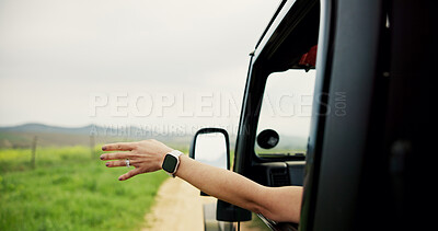 Buy stock photo Hands, person and window of car for road trip with fresh air, travel and adventure freedom. Woman, vehicle and breeze with sensory experience, driving journey and explore nature for holiday in safari