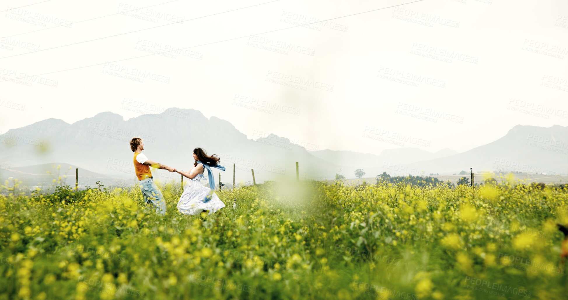 Buy stock photo Canola farm, running and couple in nature for adventure, fun and exploring together on summer holiday. Field, outdoor and man with woman for bonding in flower environment in countryside for vacation.