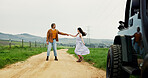 Outdoor, dancing and couple with love, travel and romance with relationship, care and trust. Road trip, vehicle and man with woman, holding hands and holiday with nature, marriage and anniversary