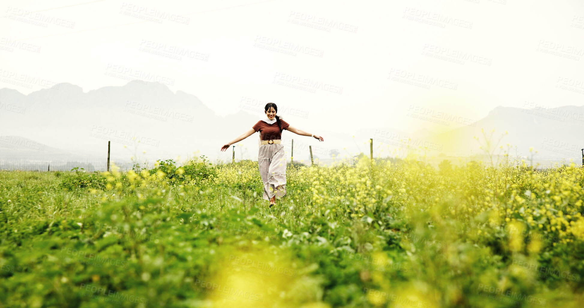 Buy stock photo Dancing, woman and fun in field, happy and adventure in nature, celebration and carefree on holiday. Outdoor, space and person on summer vacation, traveler and break in countryside or fresh air