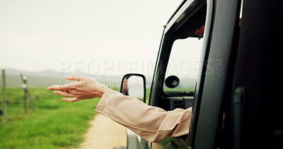 Buy stock photo Hands, person and window of vehicle for road trip with fresh air, travel and adventure freedom. Woman, car and breeze with sensory experience, driving journey and explore nature for holiday in safari