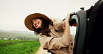 Woman, car and window with freedom for road trip, adventure and travel or journey in countryside. Excited, female person and passenger with transport in vehicle for holiday, vacation with tourism