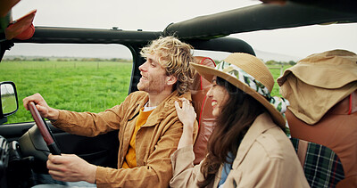 Buy stock photo Travel, couple and laughing in car for road trip, holiday adventure and funny ride together. Relationship, happy people and getaway in vehicle for countryside tourism, vacation journey and bonding