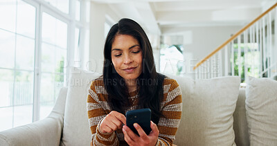 Buy stock photo Reading, phone and relax with woman on sofa for social media, communication and network app. Contact, connection and online chat with person in living room of home for comment on post and scroll