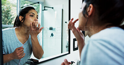 Buy stock photo Woman, bathroom and lip balm by mirror with self care, moisturizer and reflection with grooming in home. Person, skincare and beauty product for mouth, wellness and routine in morning at apartment