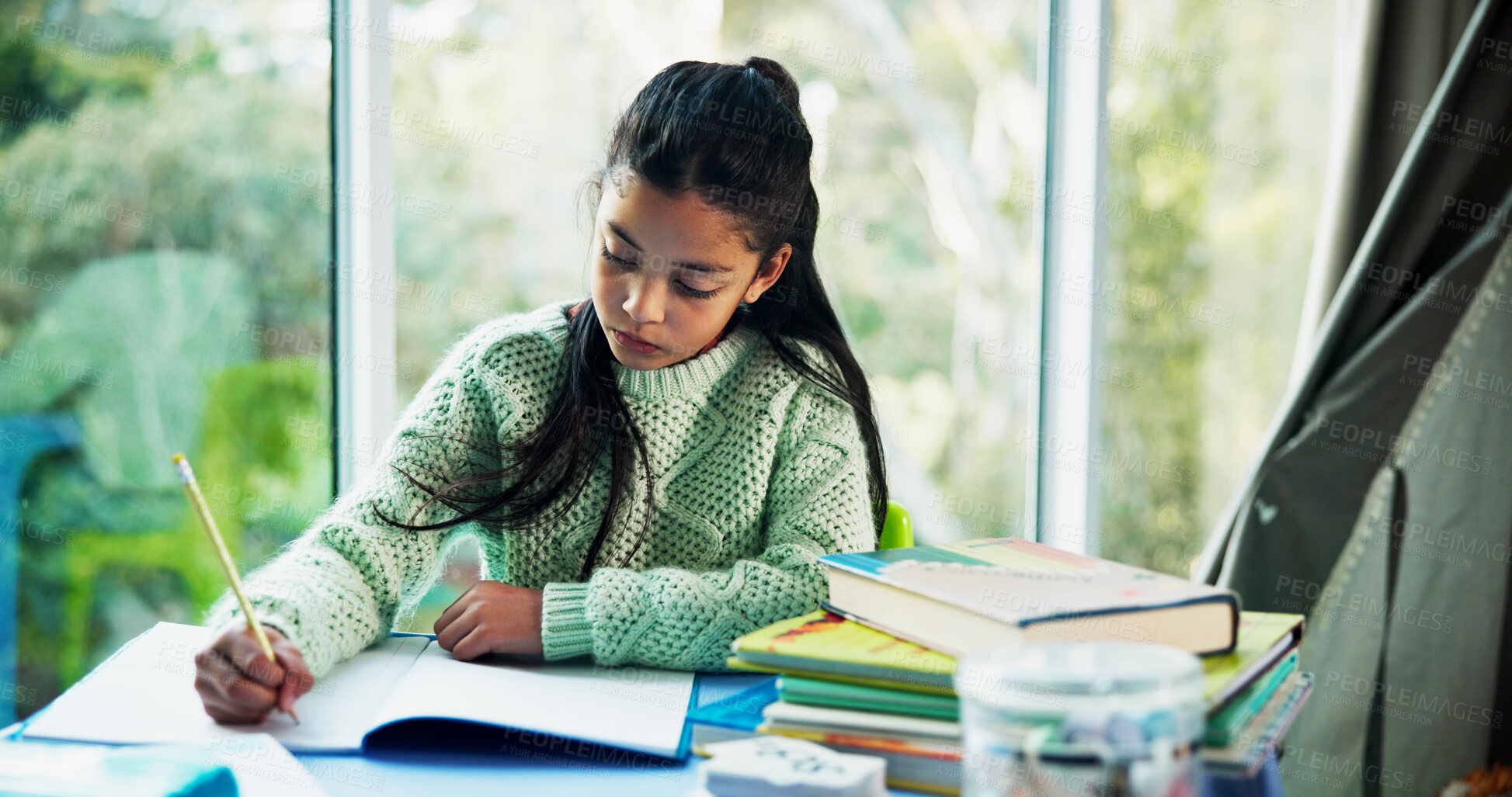 Buy stock photo Student, learning and child writing in home for fine motor skills, language activity and assessment. Books, girl kid and handwriting practice in homeschool for academic development, literacy or study