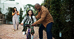 Parents, bicycle and girl with learning, phone and recording video for memory, outdoor and bonding. People, mother and father with child, smartphone or photography for teaching with balance on bike