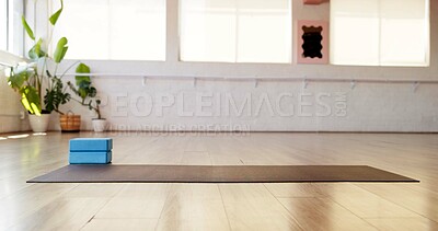 Buy stock photo Yoga, block and empty room with mat in studio for fitness, equipment and wellness class. Pilates session, exercise space and interior of health club for training setup, holistic gear and gym center