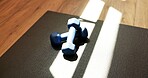 Yoga, dumbbells and equipment with mat in studio for fitness, empty room and wellness class. Pilates session, exercise weights and interior of health club for training setup, holistic gear and gym