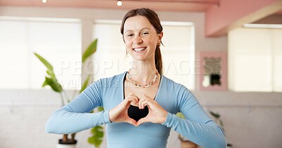 Buy stock photo Heart hands, portrait and yoga with woman in studio for fitness, holistic health or wellness. Balance, emoji and love with happy yogi person in class for commitment or dedication to exercise