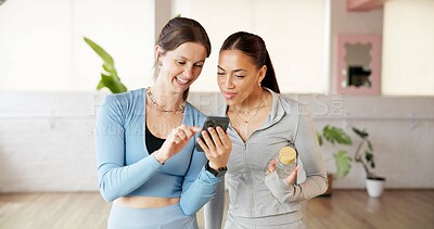 Buy stock photo Phone, pilates and scroll with friends in studio for social media, workout post and comment. Online yoga discussion, communication app and chat with women in class for wellness, health and support