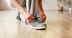 Person, hands and tie with shoes for workout preparation, start exercise or indoor training. Closeup, active or tying laces with sneakers or getting ready for fitness, run or gym in health club