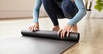 Yoga mat, rolling and woman in studio, hands and inner peace with wellness, start and calm. Closeup, yogi and healthy person with morning routine, break and hobby with stress relief and workout
