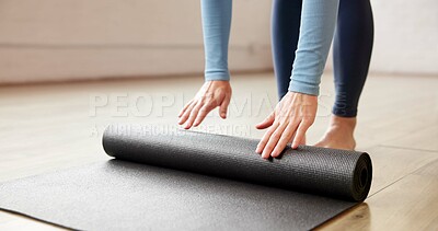 Buy stock photo Yoga mat, meditation and woman in studio, hands and rolling with wellness, start and calm. Closeup, yogi and healthy person with routine and equipment with stress relief, inner peace and workout